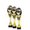 Motorsport (prilba) na čierno-zlatej trofeji